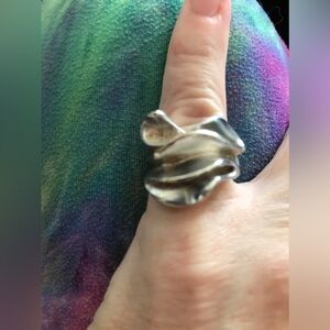 Elegant Silver Wave Ring by Aureus + Argent
Sold at Banana Republic size 7 new
